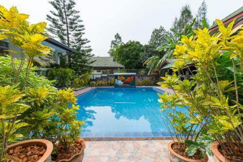 Private Poolvilla Mit Wasserfall