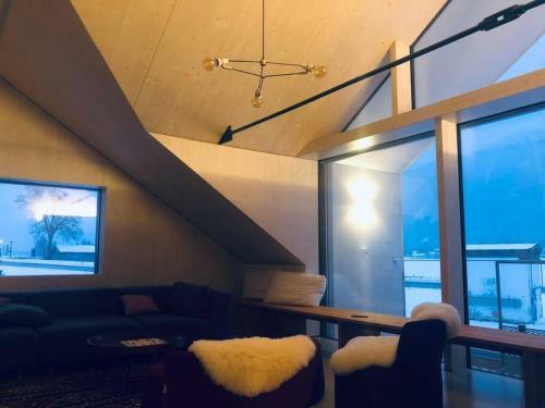 Urban Alpine Penthouse With Lake View