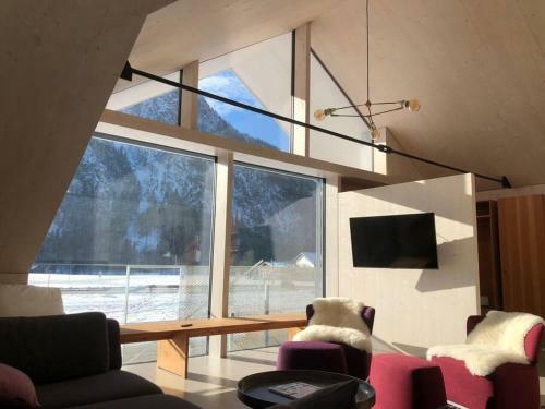 Urban Alpine Penthouse With Lake View
