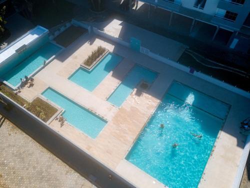 Apartamento Ubatuba, Ar, Varanda Gourmet, Piscinas E 300mt Praia