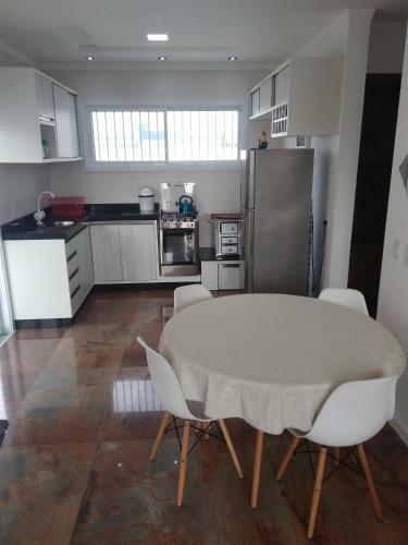 Casa Nova Praia Bella Torres Sc