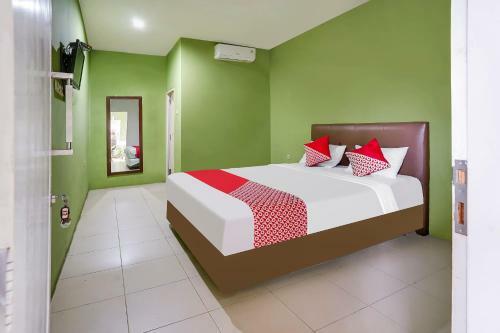 Oyo 91027 Note Hotel Syariah