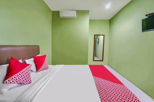 Oyo 91027 Note Hotel Syariah
