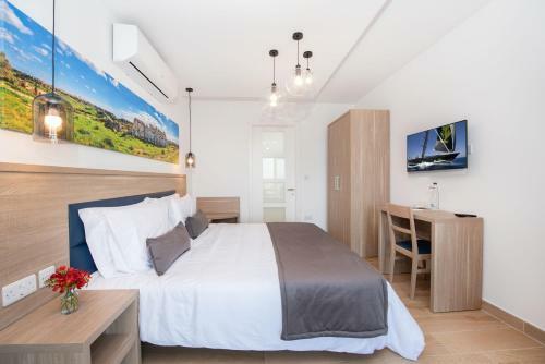 Hostal George's Boutique Living
