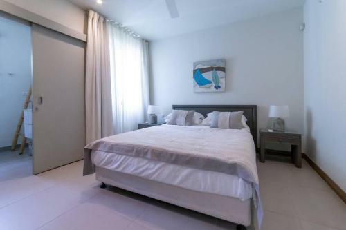 Apartamento Amaranth 3: Lovely 3-bedroom On The Beach With Rooftop Pool