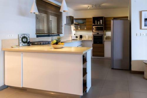 Apartamento Amaranth 3: Lovely 3-bedroom On The Beach With Rooftop Pool