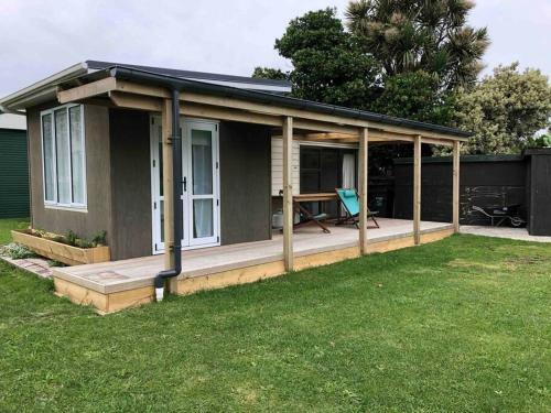 Apartamento @taradise-opunake - Eco-friendly Coastal Hideaway
