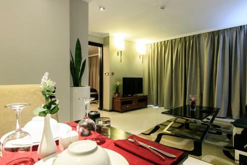 Red Mango Hotel And Apartments