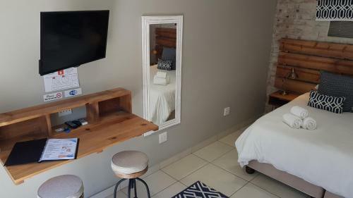 Hostal Touching Senses Garden Cottages