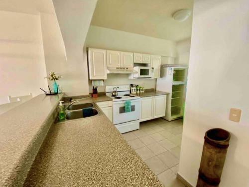 Apartamento Beautiful Beach Condominium - Costa Bonita Resort