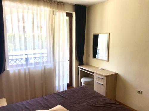 Apartment In Aparthotel Maxi