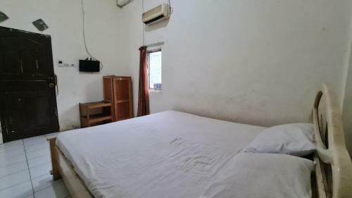Hotel Oyo 91200 Wisma Gio Amanda