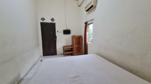 Hotel Oyo 91200 Wisma Gio Amanda