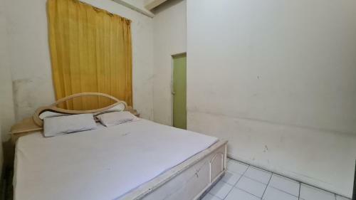 Hotel Oyo 91200 Wisma Gio Amanda