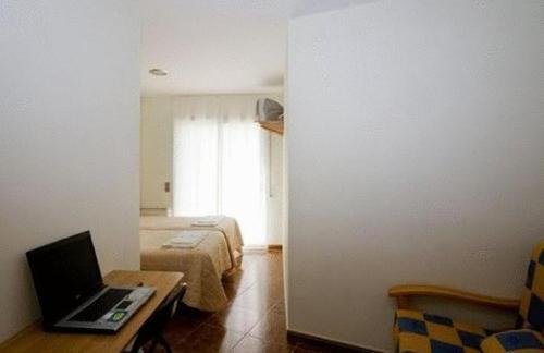 Hostal Amolls Restaurant I Habitacions