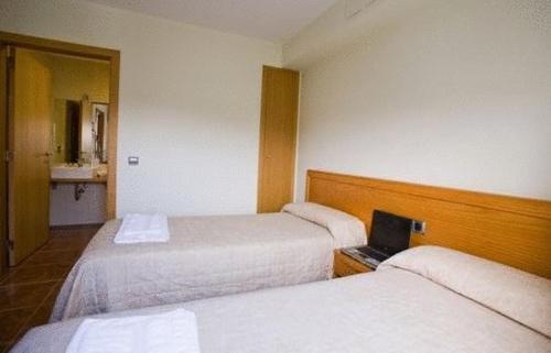 Hostal Amolls Restaurant I Habitacions