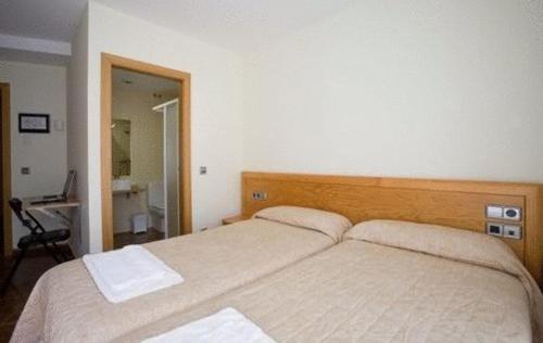 Hostal Amolls Restaurant I Habitacions