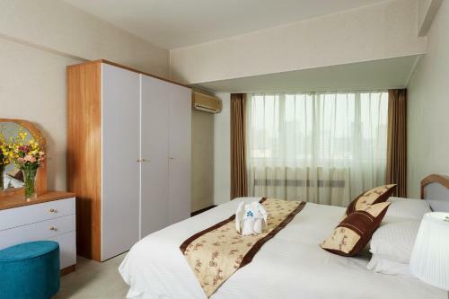Aparthotel Hotel Nikko Apartment Dalian