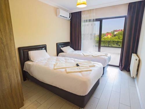 Apartamento Lil'a Grande Deluxe Hotel By Al Amoudi