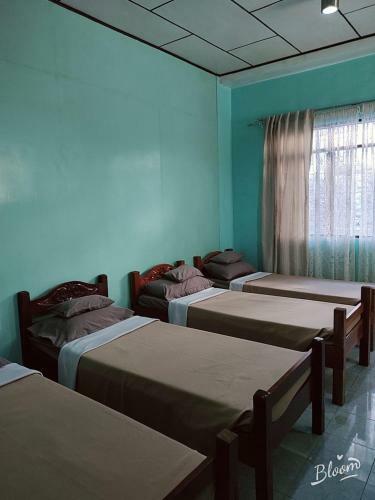 Apartamento Reir Accommodation & Event Center -twin Double Green Bedroom