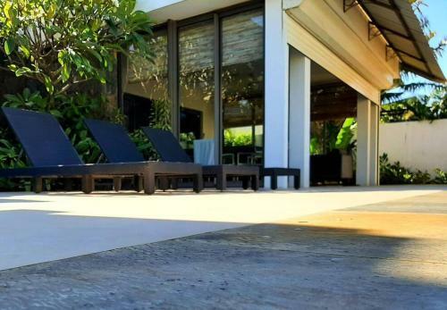 Pool Villa Surrounded By Tropical Greenery