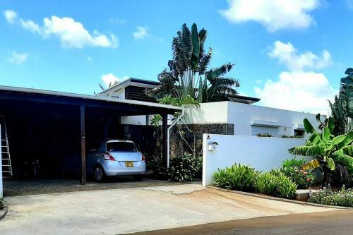 Pool Villa Surrounded By Tropical Greenery