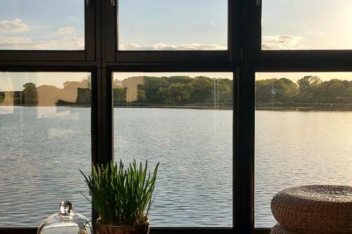 House With Feet In The Water And Magnificent View