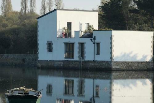 House With Feet In The Water And Magnificent View