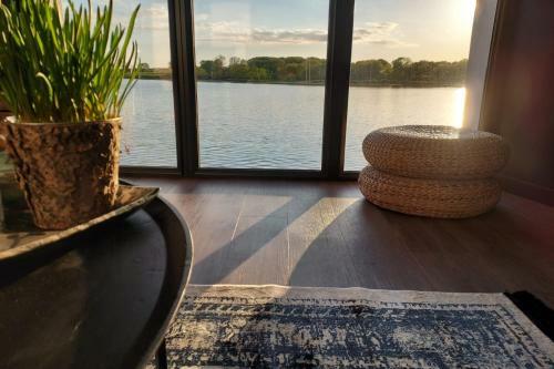 House With Feet In The Water And Magnificent View