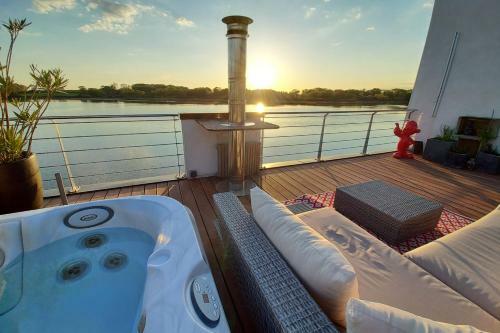 House With Feet In The Water And Magnificent View