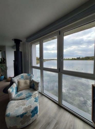 House With Feet In The Water And Magnificent View