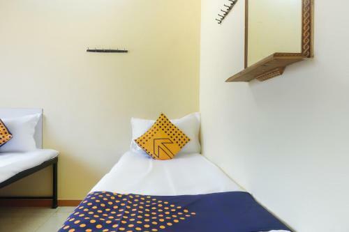 Hotel Spot On 63107 Trimurti Yatri Niwas