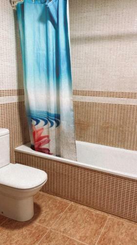 Agradable Adosado Con Piscina Comunitaria