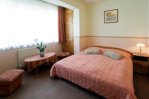 Hostal Fam�lia Vend�gh�z