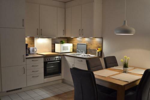 Apartamento Ferienwohnung - Gasthof Meetz Fehmarn
