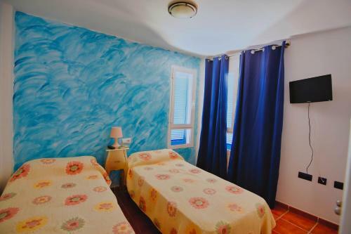 Hostal Marlop�s Rooms