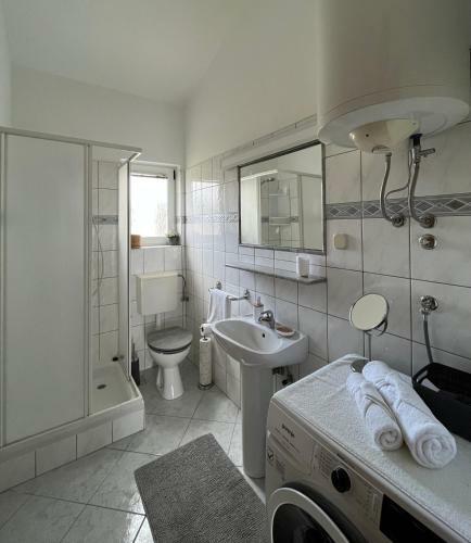 Apartmani Tino I Leon