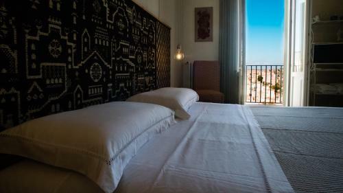 Hostal L'incanto Luxury Rooms