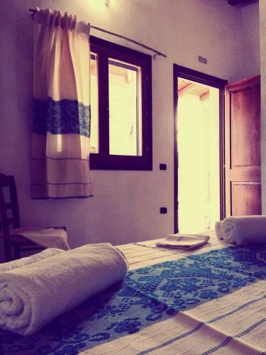 Hostal Affittacamere Munduge