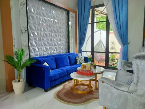 Hotel Express O 91277 Atiq Homestay Syariah