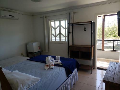 Hostal Su�tes Enseada