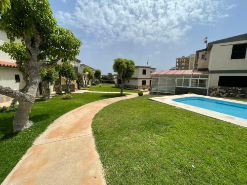 Apartamento Bajo Con Jard�n Y Piscina - Forcat.