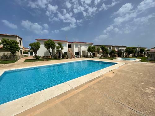Apartamento Bajo Con Jard�n Y Piscina - Forcat.