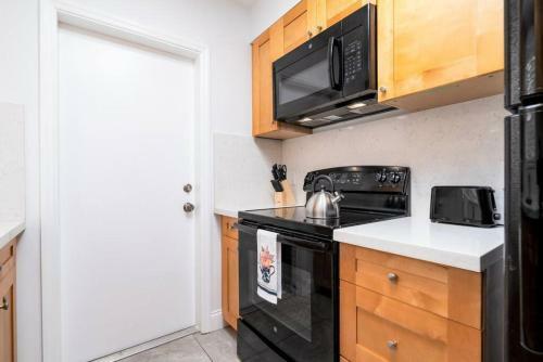 Apartamento Bayshore Breeze 7 - King Bed, Kitchen, Parking