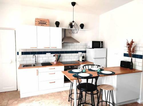 Apartamento L'antique Spa: Jacuzzi Sous Patio