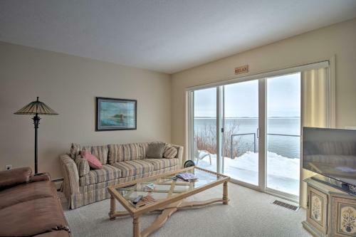 Lakefront De Tour Village Home With Deck And Fire Pit!