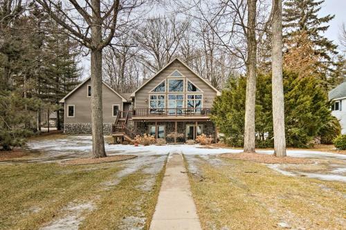 Lakefront Roscommon Home With Dock, Patio, And Games!
