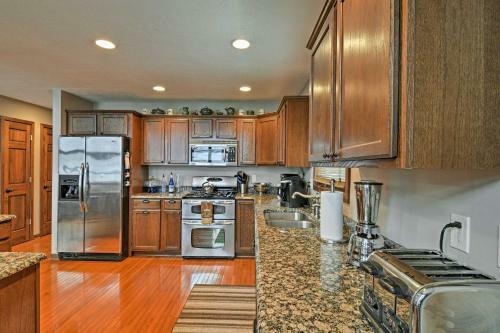 Lakefront Roscommon Home With Dock, Patio, And Games!