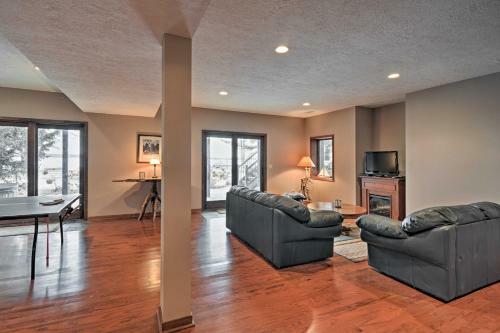 Lakefront Roscommon Home With Dock, Patio, And Games!