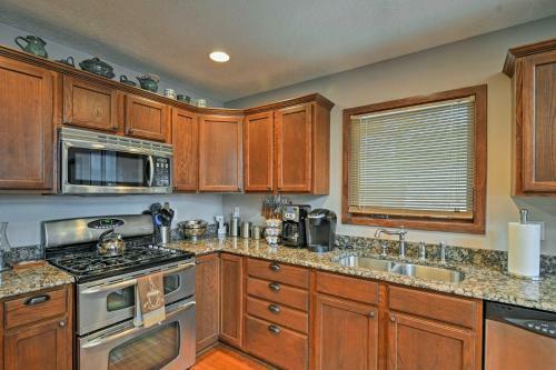 Lakefront Roscommon Home With Dock, Patio, And Games!